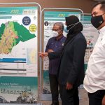 Nolee Ashilin (second from right) looking at the Ipoh Local Draft Plan 2035 with Ipoh mayor Datuk Rumaizi Bahrin (left) and PLANMalaysia deputy director (planning) Mohamad Faidzal Hamzah. — Photo by RONNIE CHIN/The Star